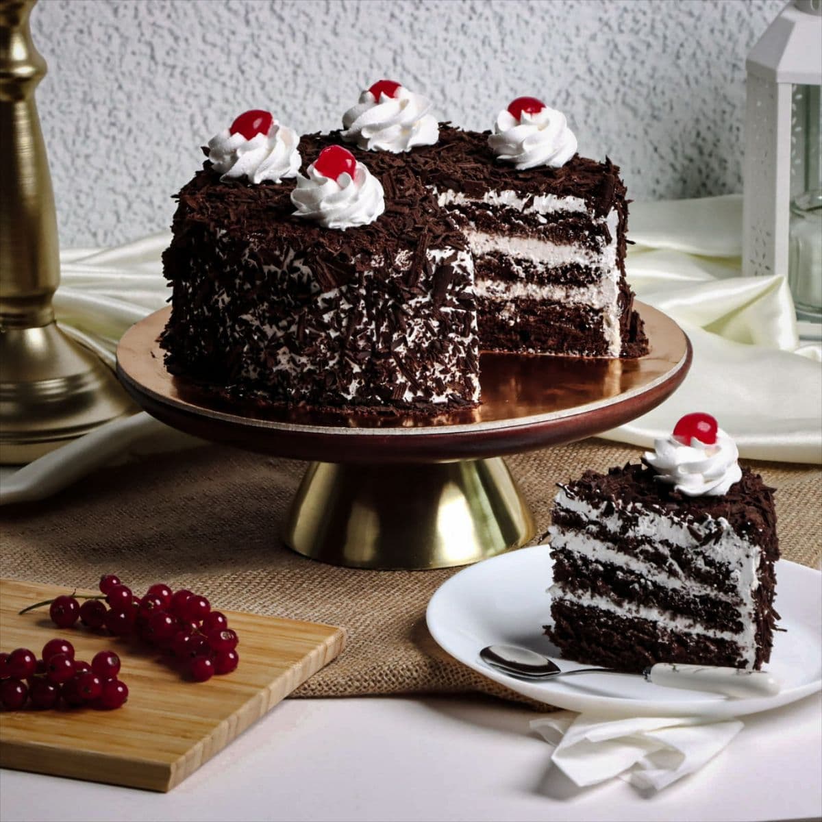 Black forest cake with cherries and whipped cream