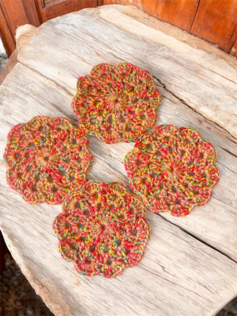 Handmade wool crochet coasters — set of 4 in autumn tones